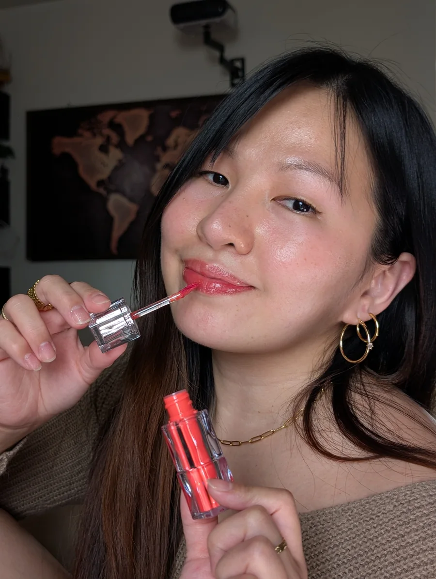 Mary Jane applying a lip product