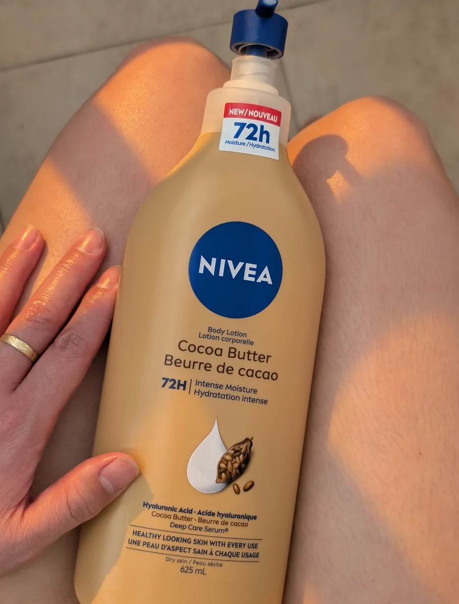 Nivea cocoa butter body lotion in warm sunlight